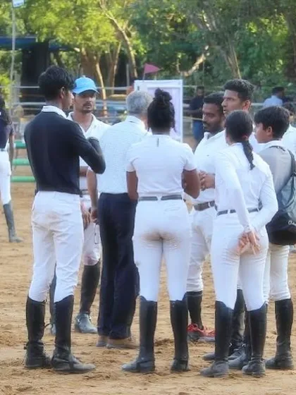 Another shot of my team huddle at the Auroville Horse Show. Clear communication and teamwork are essential for a successful competition.