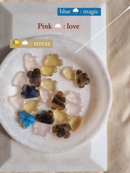 My candy clouds collection. This bowl of cloud-shaped stones includes blue Labradorite for magic, yellow Lemon Quartz for stress, and pink Rose Quartz for love.