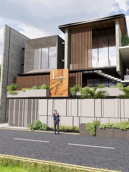 An angled render of 'The Stepped Outhouse,' highlighting the external staircase and the depth created by the layered volumes. The design uses a palette of monoblock concrete and wood for a minimalist yet warm aesthetic.