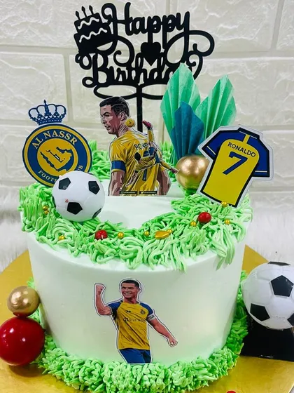 For the sports fan in your life, I can create a cake that celebrates their favorite team or player. This Cristiano Ronaldo themed cake was a huge hit for a young football fan's birthday.