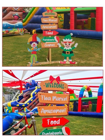 Fun directional signposts are a great way to guide guests and add to the theme. These signs for a Christmas carnival point the way to the flea market, amusement rides, food, and games.