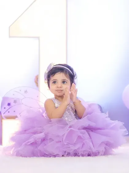 Capturing the littlest angels on their big days. This first birthday photoshoot was so much fun, complete with fairy wings and the cutest expressions. Milestone shoots are all about celebrating these precious moments.