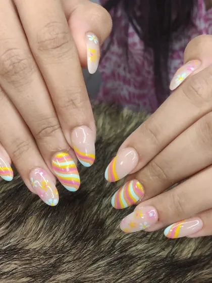 A fun pastel striped design with floral accents, perfect for an Easter or spring theme.