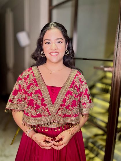 Another shot of her radiant smile, showing how the makeup enhances her joyful expression.