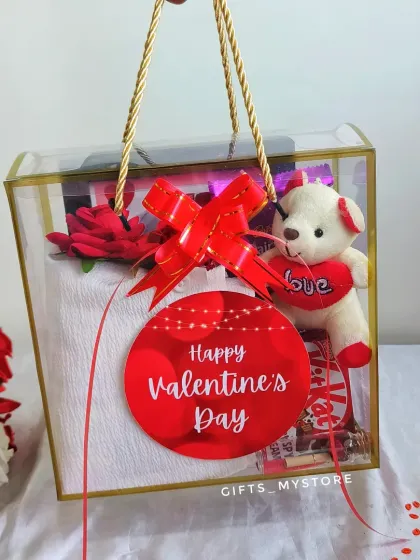 It's time to pamper your boy! This budget-friendly Valentine's hamper for him includes a shirt, photo frame, teddy bear, and chocolates.