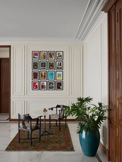 To celebrate Maddock's incredible legacy of over 35 films, I created this quiet tribute wall. Instead of a loud display, the film posters are arranged in a simple collage, framed by classic paneling. It’s a humble yet proud showcase of their work, reflecting an ethos of storytelling without pretense.
