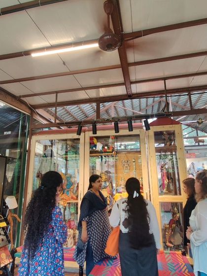 Guests observing the detailed craftsmanship of our puppets during a guided tour of the museum. Each exhibit is designed to offer insights into the cultural and regional origins of the puppets.