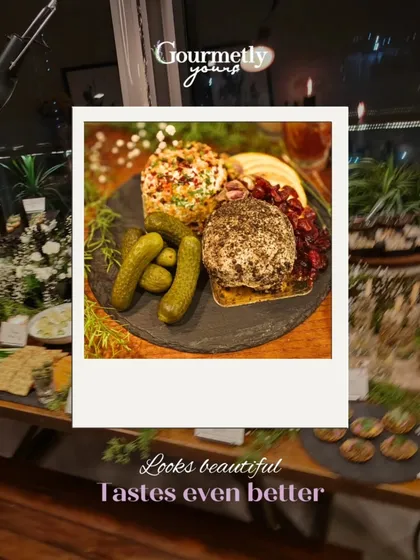 Looks beautiful, tastes even better. This polaroid-style shot features two of our artisanal cheese balls with pickles, showcasing their rustic yet elegant appeal.