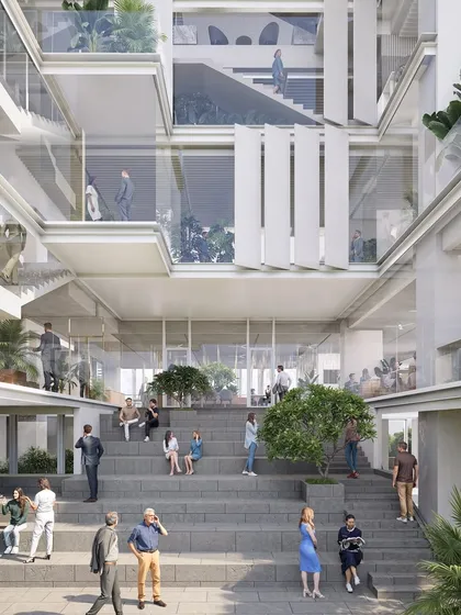 We believe the soul of a workspace lies in the spaces between, where informal connections are made and ideas flourish. This design for a modern office complex features a grand terraced plaza, creating a vibrant social heart for the building that encourages interaction and community.