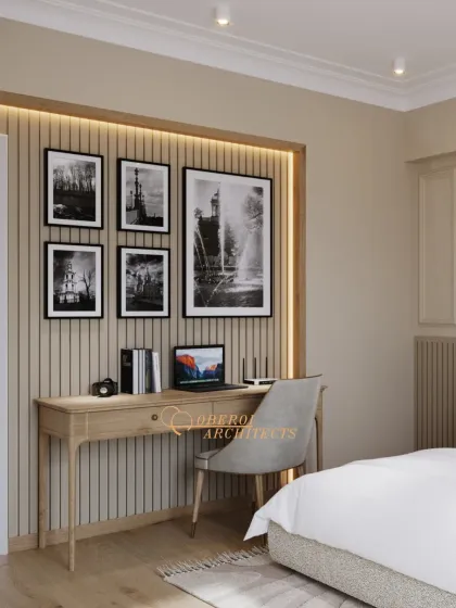 The dedicated study nook is framed with wood and features integrated lighting, making it a functional and stylish corner within the bedroom.