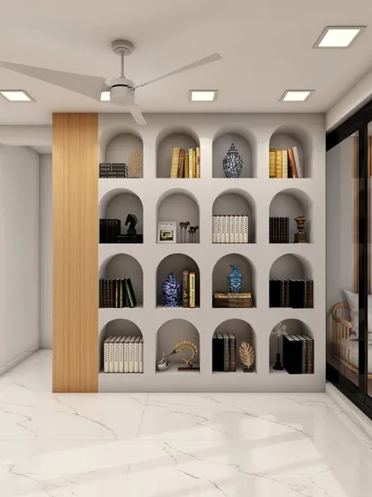 A stunning home library with floor-to-ceiling arched bookshelves, creating a grand and classic look. This design is perfect for showcasing a large book collection.