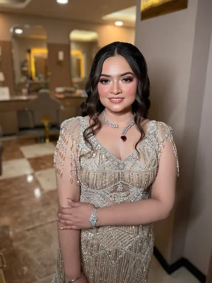 A full-length view of the bride-to-be in her gorgeous embellished gown.