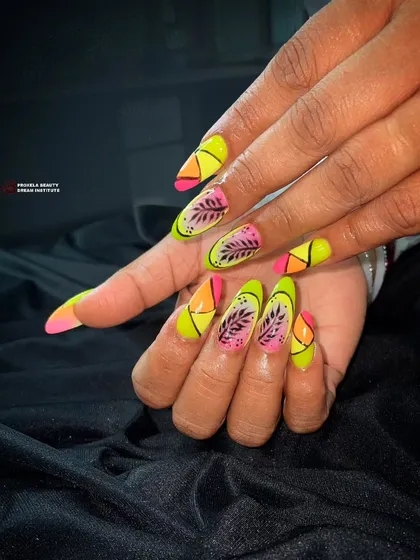 Another shot of the tropical neon nails, showing the sharp almond shape and the glossy, high-impact finish.