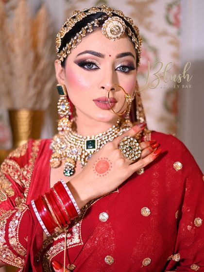 A dramatic Muslim bridal look created by a student, featuring a stunning matha patti and bold eye makeup. I am so proud of the versatility my students develop.