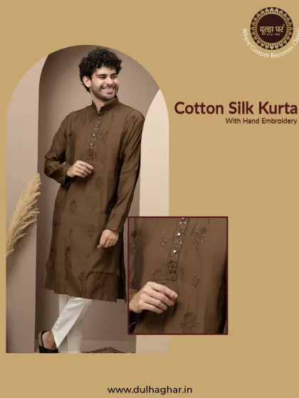 A rich brown cotton silk kurta with detailed hand embroidery on the placket, paired with white trousers for a smart contrast.