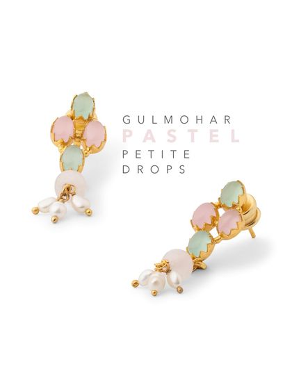 The Gulmohar Pastel Petite Drops are perfect for those who love delicate jewelry. Soft pastel-hued stones are meticulously arranged to form this charming pair of earrings.