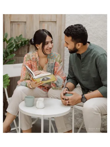 Sharing stories over a book and coffee. This lifestyle engagement shoot is perfect for couples who share a love for quiet, meaningful activities.