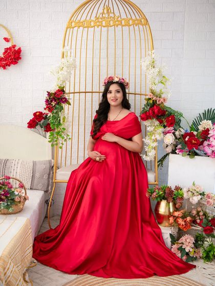 Our romantic floral set, styled with vibrant red and white flowers. This setup is perfect for creating a classic, celebratory feel, especially when paired with a bold red gown.