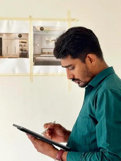 Making notes and modifications to the digital plan on my tablet during a site visit. Technology helps me stay precise and organized.