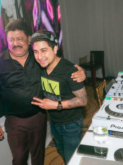 Posing with a happy family member at the Phuket wedding. Making sure the family has an unforgettable time is a huge part of my job as a wedding DJ.