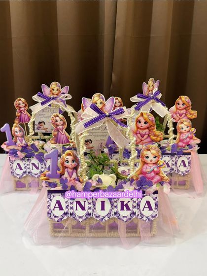 A group of Rapunzel-themed jute basket hampers ready for Anika's birthday guests.