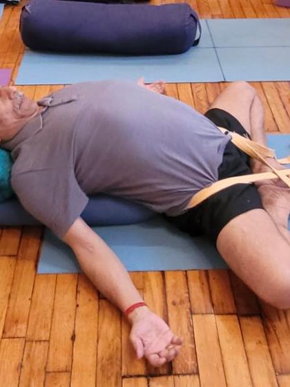 Supta Baddha Konasana on a bolster.