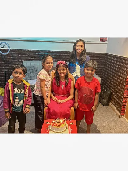 Celebrating another student's birthday at the academy. We always make time for cake and good wishes, because every student is important to us.