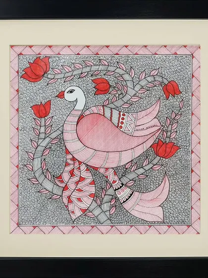 This Madhubani artwork by Rinki Joshi features a graceful pink bird surrounded by red tulips. The piece has a gentle, storybook quality, created through soft colors and flowing lines.