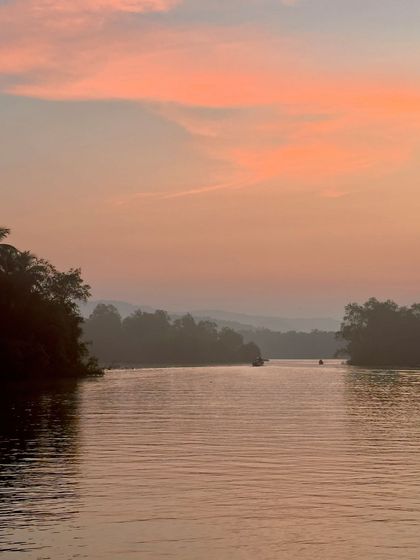 A serene sunset over the Honnavar backwaters, a peaceful and beautiful end to the day.