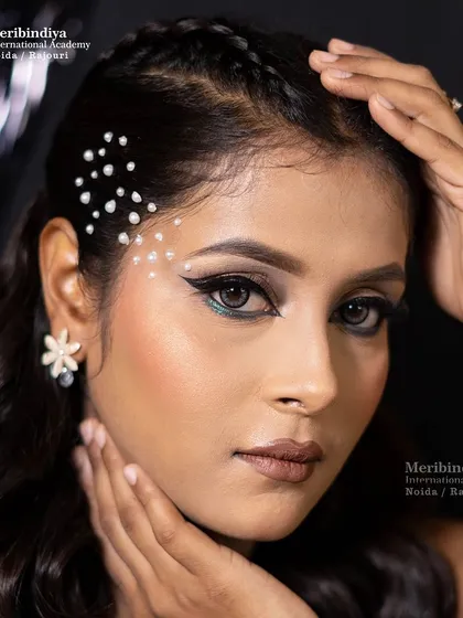 This look pushes creative boundaries with pearl embellishments on the face and hair, perfect for high-fashion editorials or music videos.