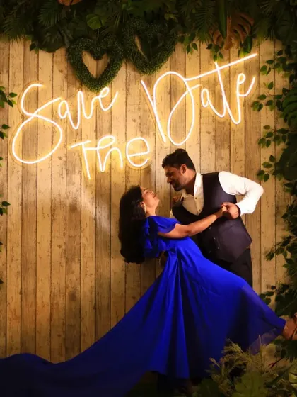 Announce your big day in style. This couple rented our royal blue trail gown for their "Save the Date" photoshoot, creating a memorable and romantic image.