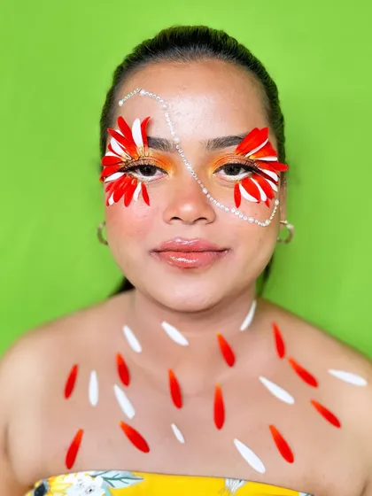 A full-face view of the creative floral makeup, showcasing the complete, artistic look created by our student.