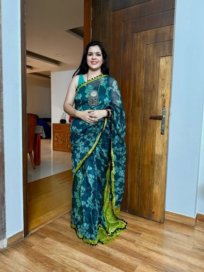 A May photo dump featuring this beautiful teal printed saree. It's a lightweight and comfortable option for daily wear or a casual outing.
