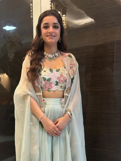 Another portrait of the client, looking confident and happy with her final look.