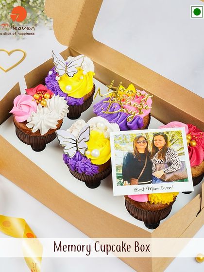 Our Memory Cupcake Box for Mother's Day allows you to add a personal touch with a photo, surrounded by beautifully decorated cupcakes.