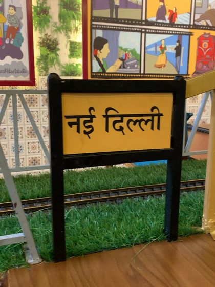 The "New Delhi" station sign at Railicious adds to the fun, train-themed decor of the restaurant. It's these little details that make the dining experience so memorable.