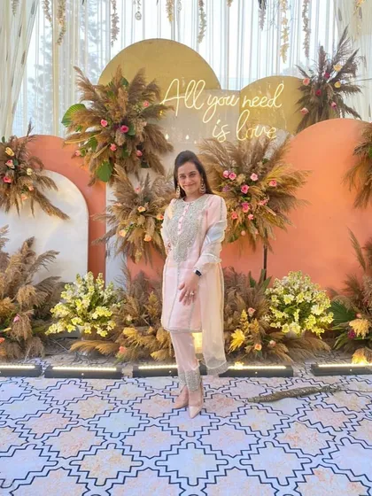 This is one of my favorite times of the year because I get to wear beautiful Indian outfits. This look, with its delicate embroidery and soft color palette, was perfect for a daytime festive event.
