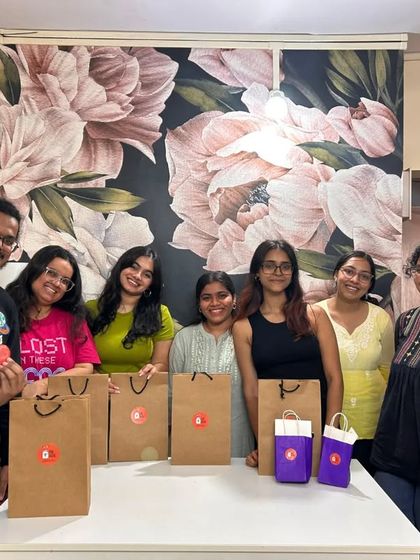 The R&D team poses with their Bookwallah merchandise after a fun and productive bonding session.