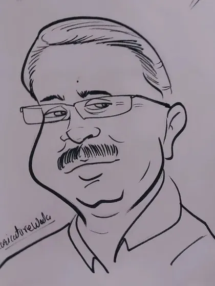 Waiting for his reaction. I think I captured his likeness well in this caricature.