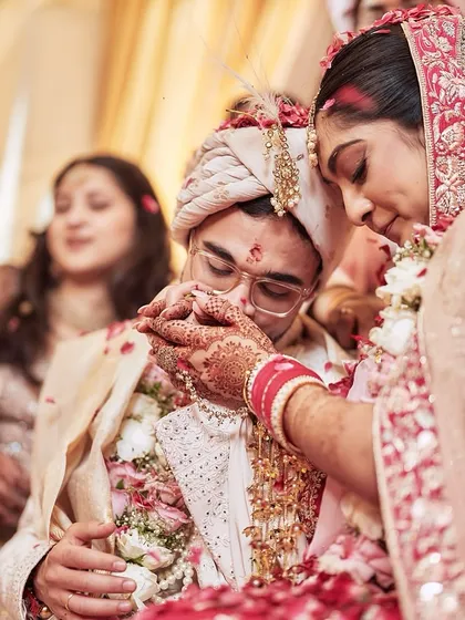An intimate moment during the wedding ceremony. My focus is on creating an environment where couples can feel connected and present, even amidst the grandeur of the event.