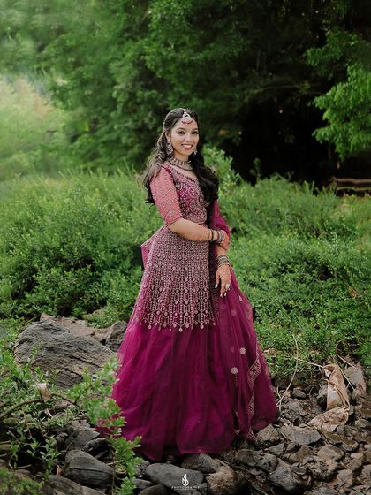 A stunning solo portrait of the bride-to-be in her beautiful attire, set against the rocky, natural landscape.