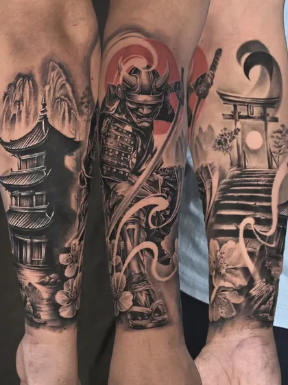 A closer look at a finished forearm cover-up. This Japanese-themed sleeve was designed to completely obscure a large, old name tattoo, creating a cohesive and dynamic piece from wrist to elbow.