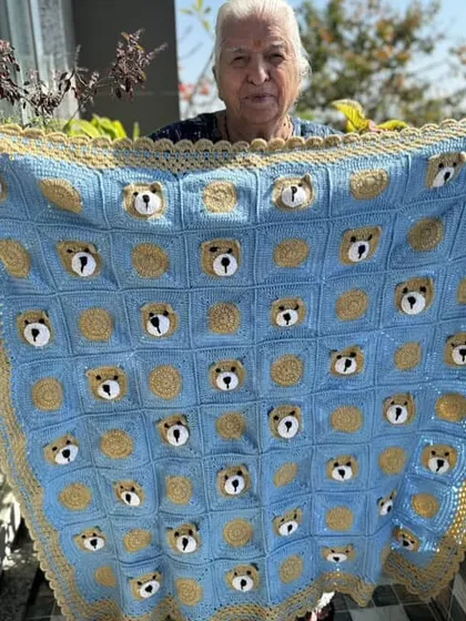 A beautiful blue and gold version of our teddy bear baby blanket. The colors can be customized to perfectly match your nursery decor.
