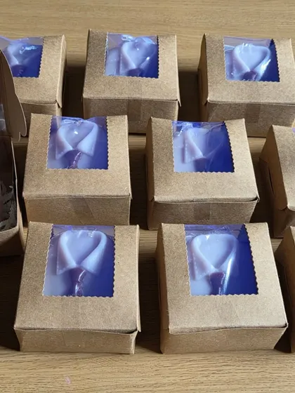 Packaging some shirt-and-tie soaps for an event. These are a popular choice for corporate gifts and Father's Day.