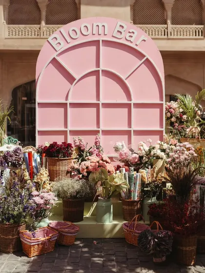We believe in making every event personal. For this Parisian market-themed Mehendi, we set up a 'Bloom Bar' where guests could create their own bouquets, adding an interactive and beautiful touch to the celebration.