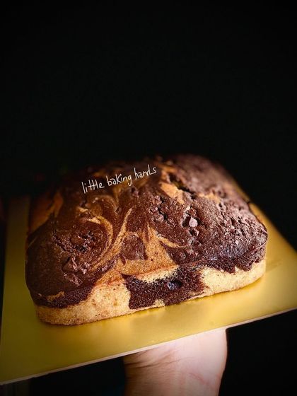 A loaf-shaped marble cake, perfect for slicing and sharing. It's a simple, wholesome, and delicious option for any school party.