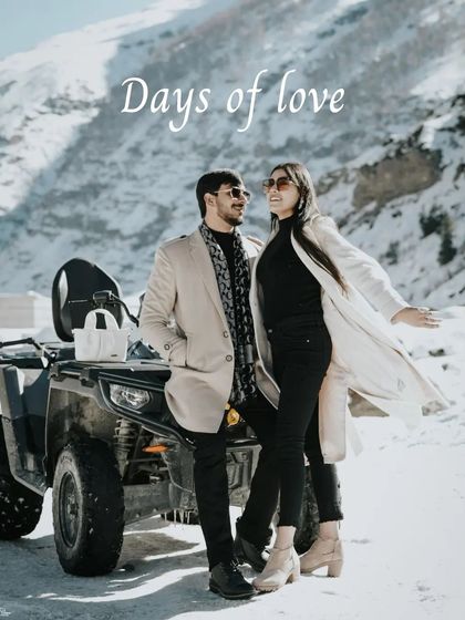 A stylish portrait of a couple posing next to an ATV in the snow, dressed in chic winter coats, blending adventure with fashion.