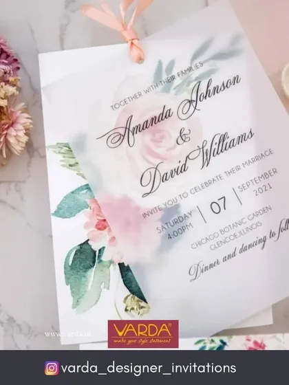 For a touch of romance and sophistication, this wedding invitation features delicate watercolor florals beneath a soft vellum overlay. The layered design creates a dreamy, ethereal feel, perfect for a classic and elegant wedding.