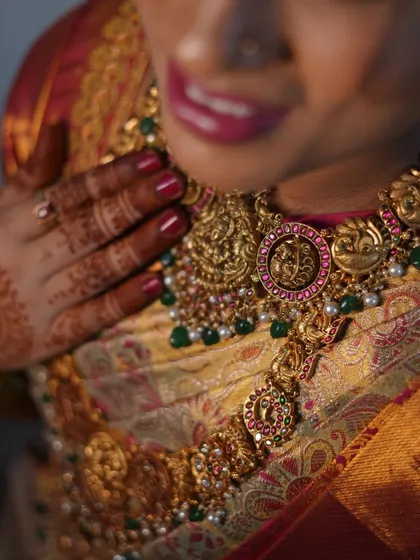 A close-up of the intricate Kempu necklace. I ensure my jewellery is comfortable to wear, especially for mothers-to-be.