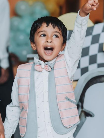The pure excitement on a child's face during the magic show. This is the kind of joy I aim to create.